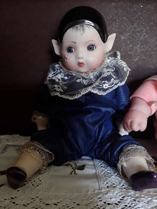 Beautiful Porcelain Pixie Doll.