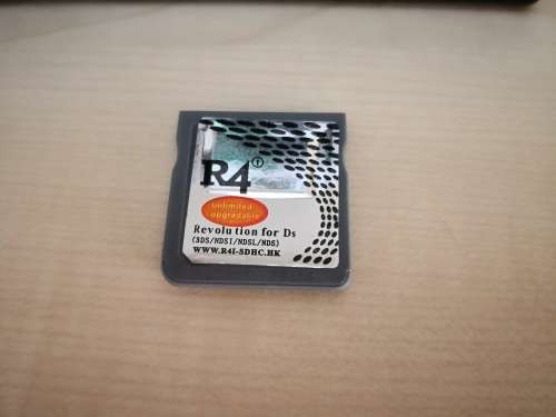 Nintendo DS Lite With Charger & R4 Cartridge & Micro SD CARD