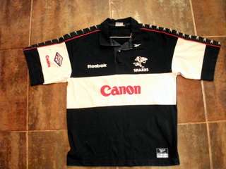 NATAL SHARKS RUGBY SHIRT BY REEBOK SIZE MEDIUM