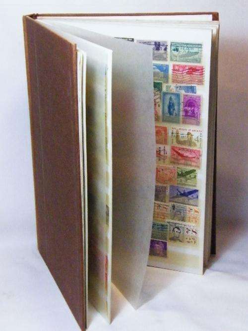 Stamp album with collection of more than 400 stamps - as per photo