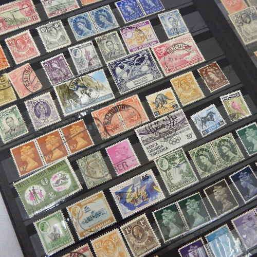 Decent stamp album with over 900 unresearched stamps sold as a lot with album