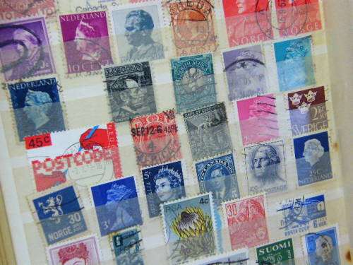 Stamp album with over 450 stamps