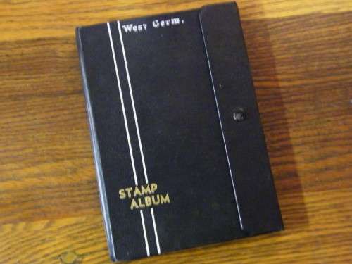 Stamp album with over 230 Southern African stamps