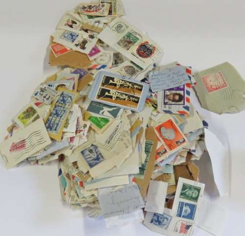 Lot of over 1000 stamps - Most on piece aps - Unsorted
