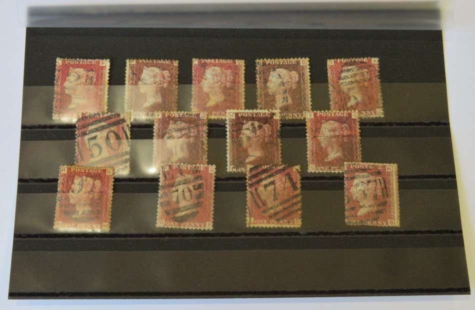 Lot of 13 penny red stamps - Some dark in colour