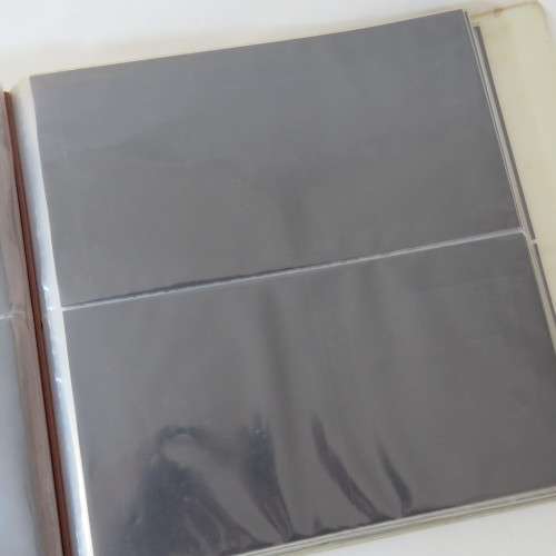 Banknote/FDC album with 128 large pouches - Used album