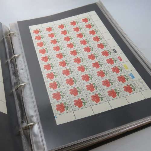 South Africa stamp loose leaf file with 48 full sheets and 9 partial sheets of stamps