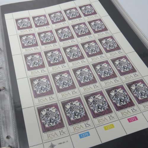 South Africa stamp loose leaf file with 48 full sheets and 9 partial sheets of stamps