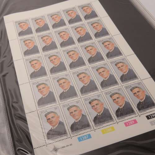 South Africa stamp loose leaf file with 48 full sheets and 9 partial sheets of stamps