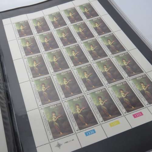South Africa stamp loose leaf file with 48 full sheets and 9 partial sheets of stamps