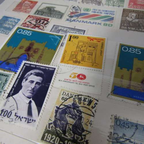 16 Page Stamp album with about 420 world stamps