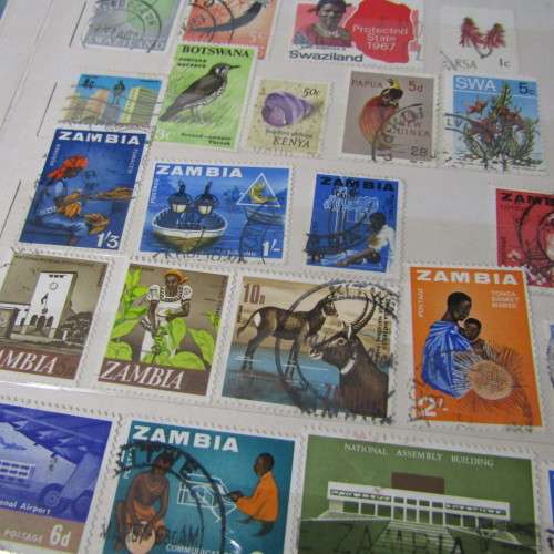 16 Page Stamp album with about 420 world stamps