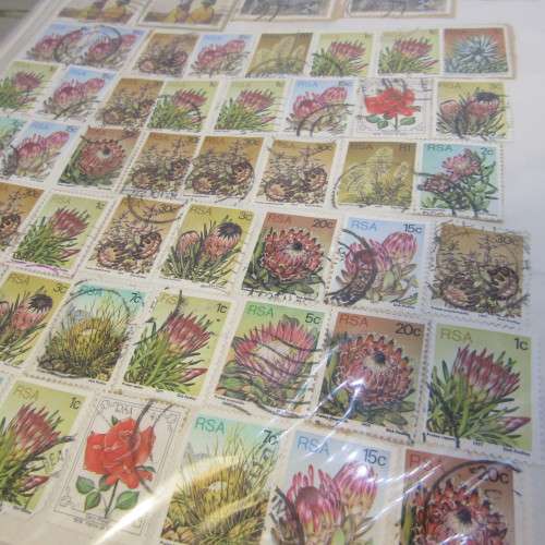 Thematic stamp collection with about 400 stamps - glued to paper