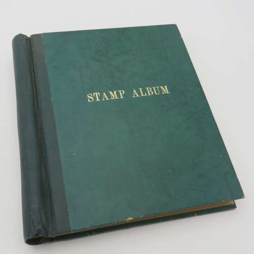 Stamp album with over 1400 stamps including South Africa, China, Switzerland, Britain ect