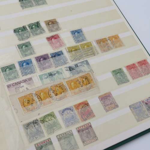 16 Page stamp album with over 700 old stamps - Some better stuff - Have a look at the photos