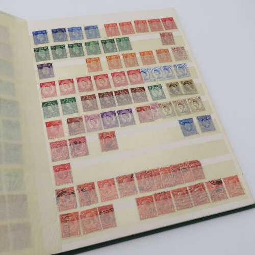 16 Page stamp album with over 700 old stamps - Some better stuff - Have a look at the photos