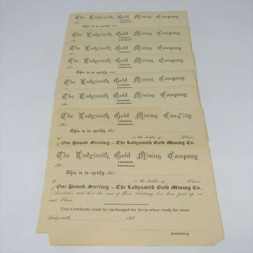 Lot of 8 unused Ladysmith Gold Mining Company share certificates - most with paper damage