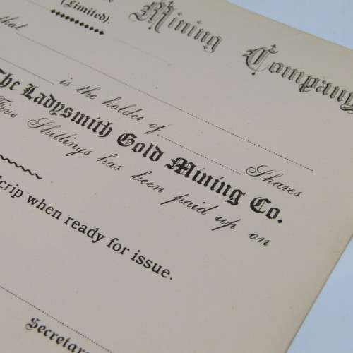 Lot of 8 unused Ladysmith Gold Mining Company share certificates - most with paper damage