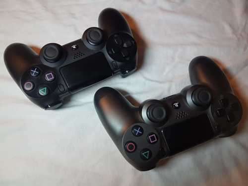 Playstation 4 1TB Console + 2 x Dualshock Controllers (plus 4 games)