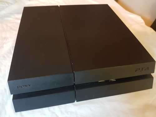 Playstation 4 1TB Console + 2 x Dualshock Controllers (plus 4 games)