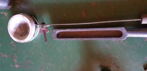 A box full of Jewellery tools Including metal roller and torches.