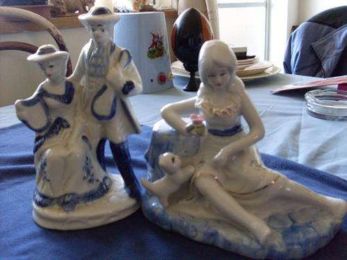 Set of two beautiful blue and white ornaments for your collection.