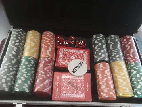 Poker Chips + Cards In a Metal Carry Case.