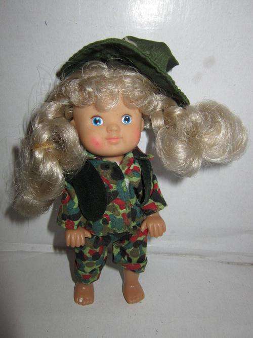 Baby in camo outfit hard plastic articulated +- 12cm