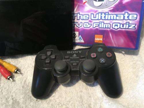 Playstation 2 - Black Slim Line Console c/w 1 x Original Controller, AV Cable Power Cord & 1 x Game