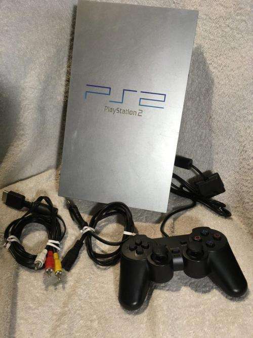 Playstation 2 - Original Silver "Phat" Console c/w 1 x Generic Controller, AV Cabl