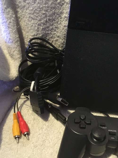 Playstation 2 - Black Slim Line Console c/w 1 x New Generic Controller, AV + Power Cable 1 x Game