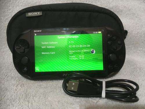 Sony PSVITA PCH2000 c/w Charger + charging cable 32 Gig memory card + Carry Case