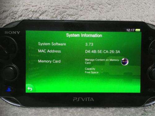 Sony PSVITA PCH1004 c/w Charger + charging cable - no memory card