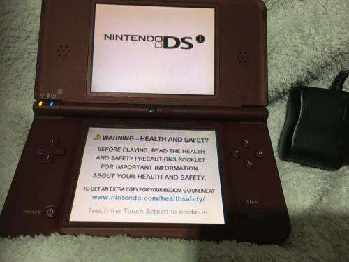 Nintendo DS XL Console Burgundy c/w new generic charger and stylus