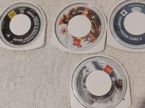 PSP 3004, No memory Card, Charger, 5 Games + 4 UMD Music videos + carry bag - see description