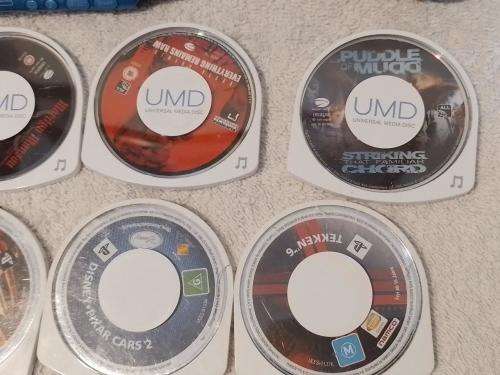 PSP 3004, No memory Card, Charger, 5 Games + 4 UMD Music videos + carry bag - see description