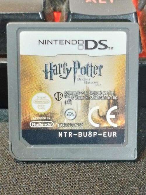 Nintendo DS Lite Pink, c/w Stylus, Generic Charger + Harry Potter Cartridge.