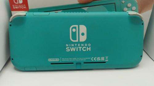 Nintendo Switch Light boxed c/w Rayman Legends Cartridge.