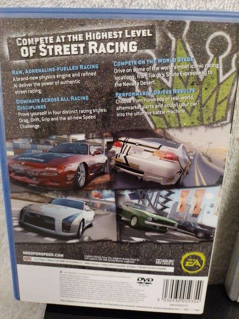 Playstation 2 - Black Slim c/w 1 x New Generic Controller, AV Cable & Power Cord + 2 Games