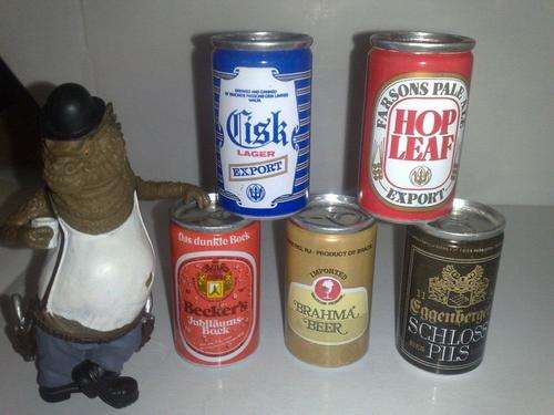 Miniature Beer Tins With a Druken Gun Slinger