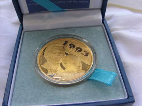 The 2007 24ct GOLD 1-OZ PROTEA Proof R25 (Nelson Mandela & FW de Klerk)