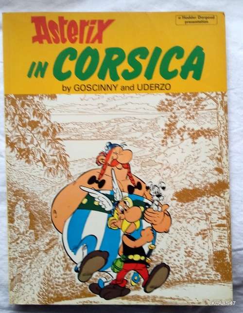 ASTERIX IN CORSICA - PAPERBACK - HODDER DARGAUD - SMALL PEN MARK & STAINS - SEE PICTURES