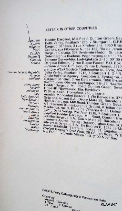 ASTERIX IN CORSICA - PAPERBACK - HODDER DARGAUD - SMALL PEN MARK & STAINS - SEE PICTURES