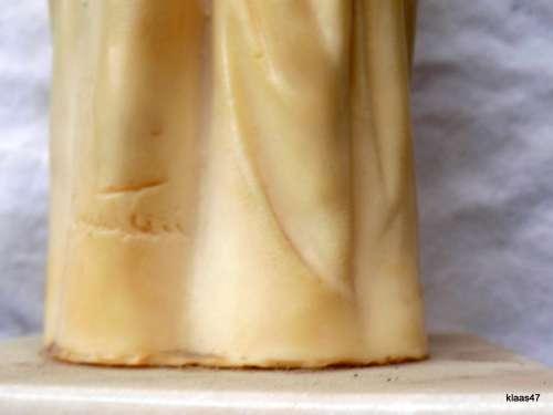 Victorian Lady - Signed A Santini - 31cm high on a 10.7x11 stand (PLEASE NOTE HER NOSE IS DAMAGED)