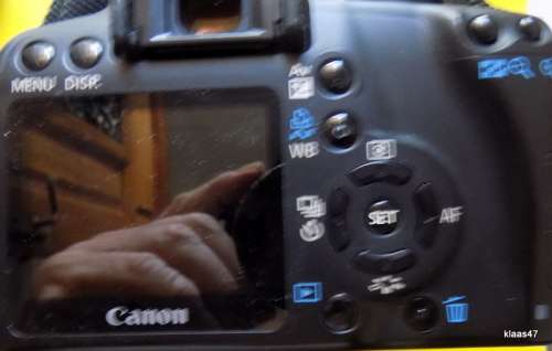 Canon EOS 1000D - Complete with Battery Charger, Instruction Booklet and Carry Case