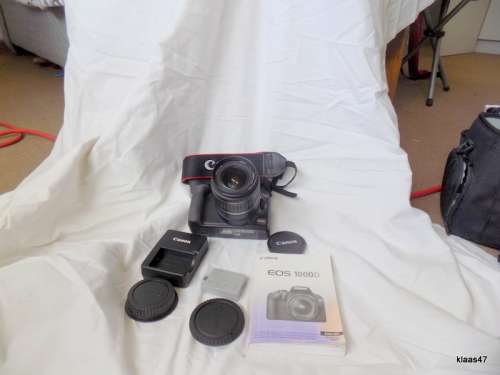 Canon EOS 1000D - Complete with Battery Charger, Instruction Booklet and Carry Case