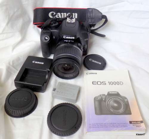 Canon EOS 1000D - Complete with Battery Charger, Instruction Booklet and Carry Case
