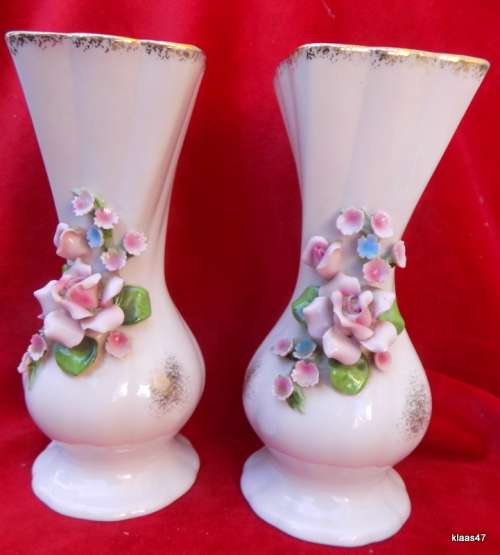 Pair of Vases with applied flowers.