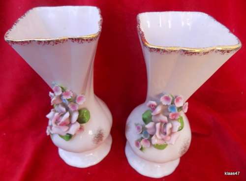 Pair of Vases with applied flowers.