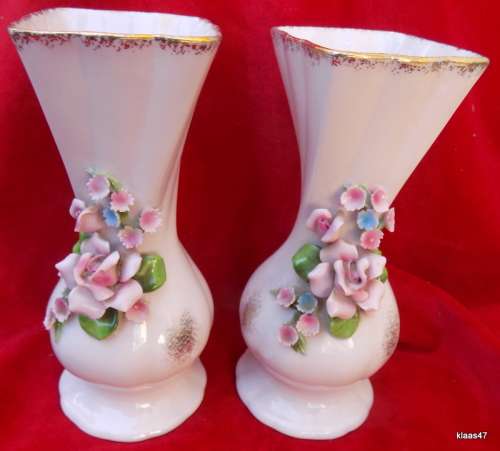 Pair of Vases with applied flowers.
